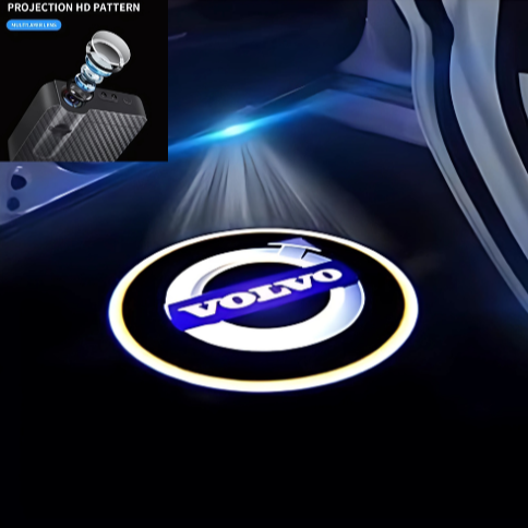 Car door welcome light with Volvo logo projection on a dark background